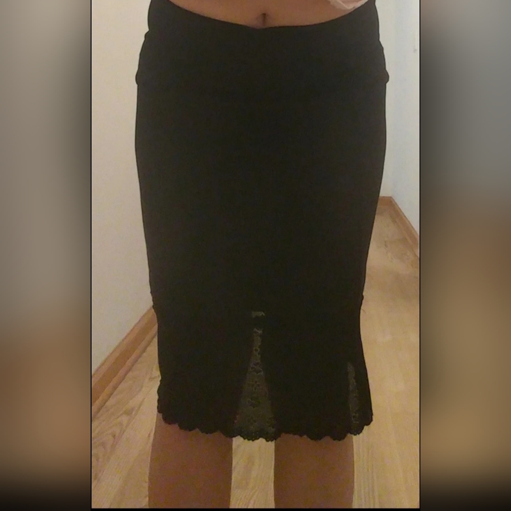Malibu brand medium stretchy 2 layer black fitted knee length skirt